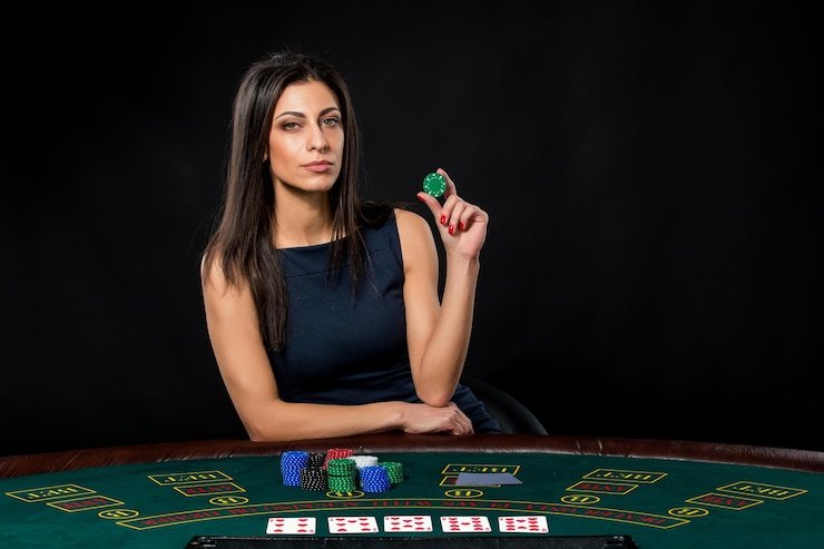 Live Ikan Hoki studio with dealer and gaming table